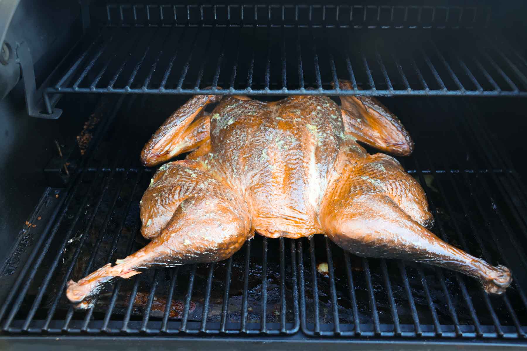 a smoked turkey done and still on the grill