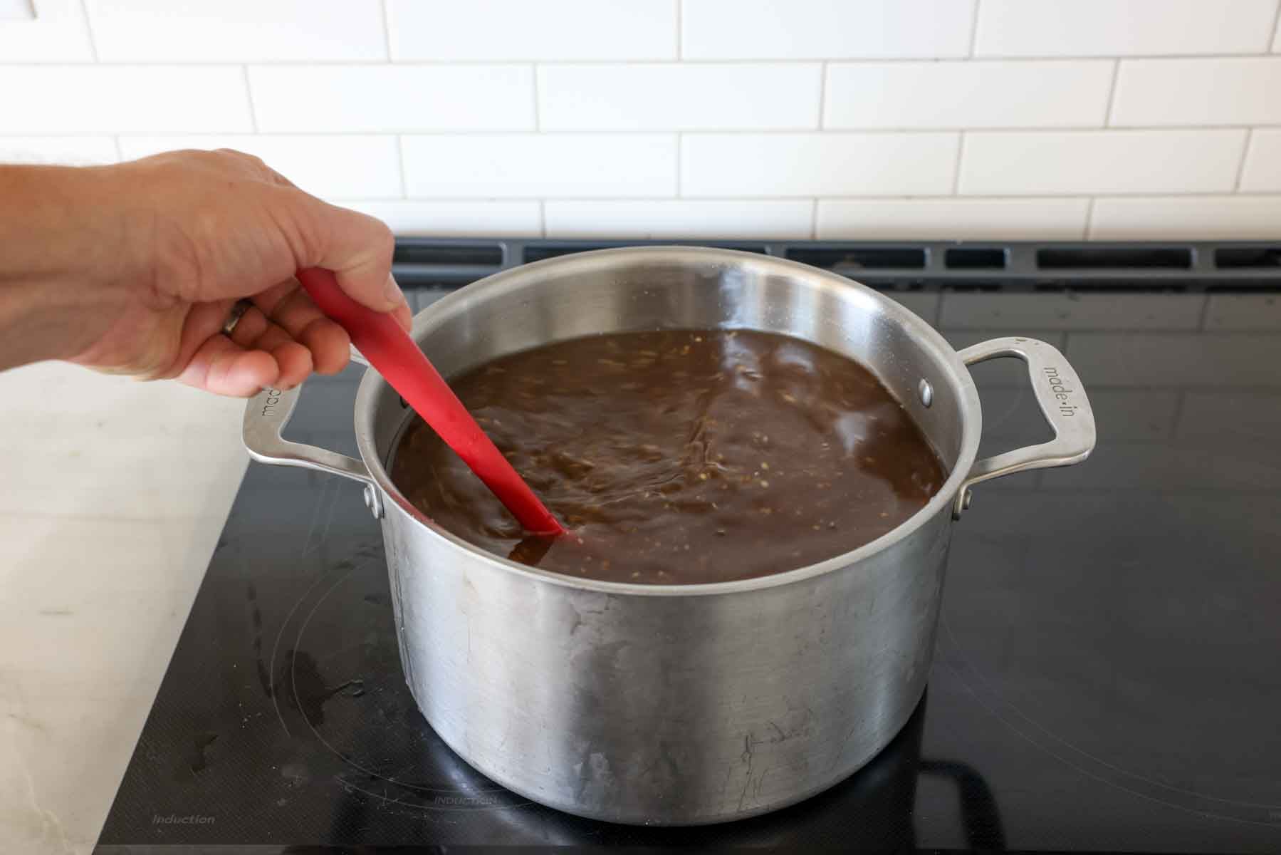 a pot of turkey brine on the stovetop in a pot