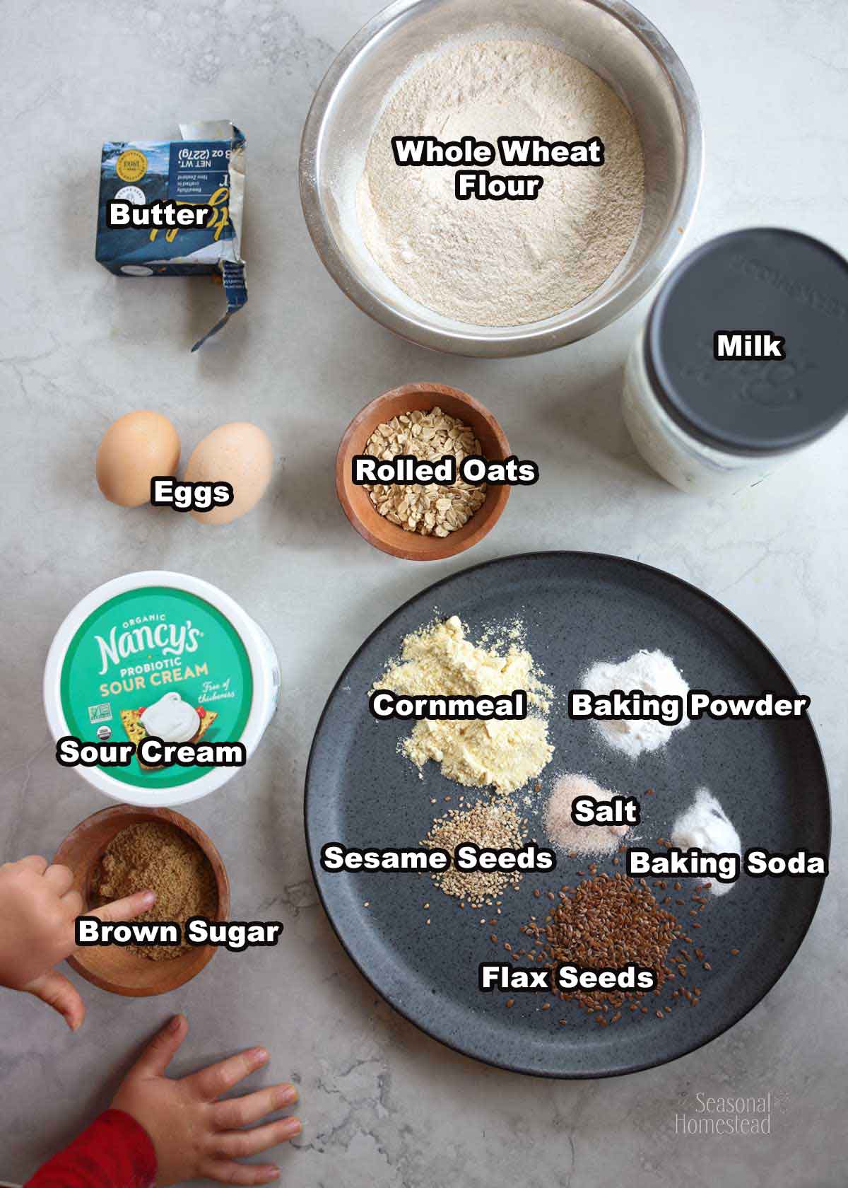 Multigrain pancake ingredients are laid out on a table and labeled.